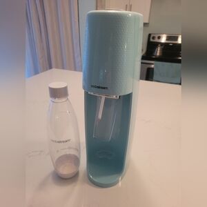 SodaStream Sparkling Water Maker in Light Blue/ Aqua With Bottle